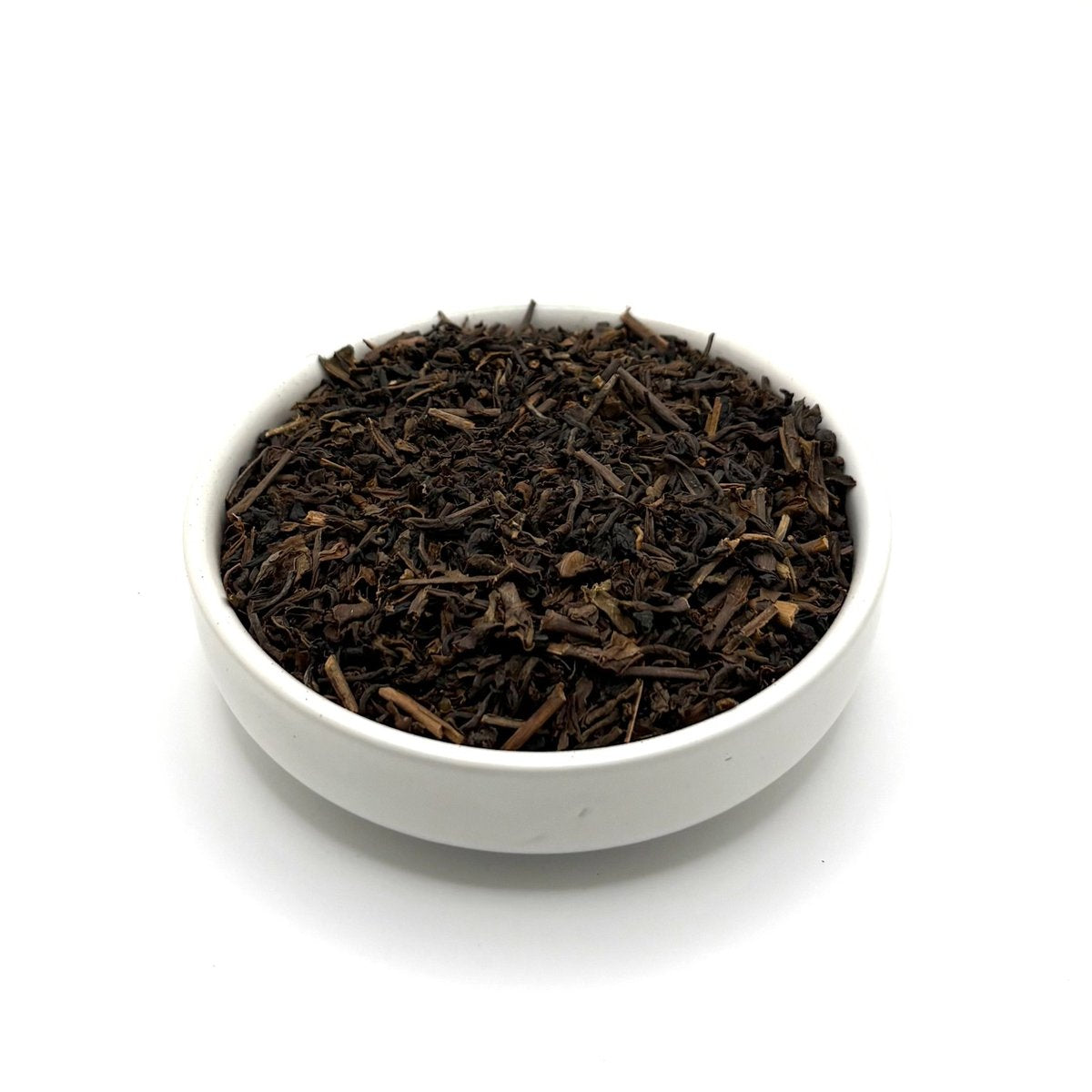 Loose leaf decaf English Breakfast tea leaves in bowl