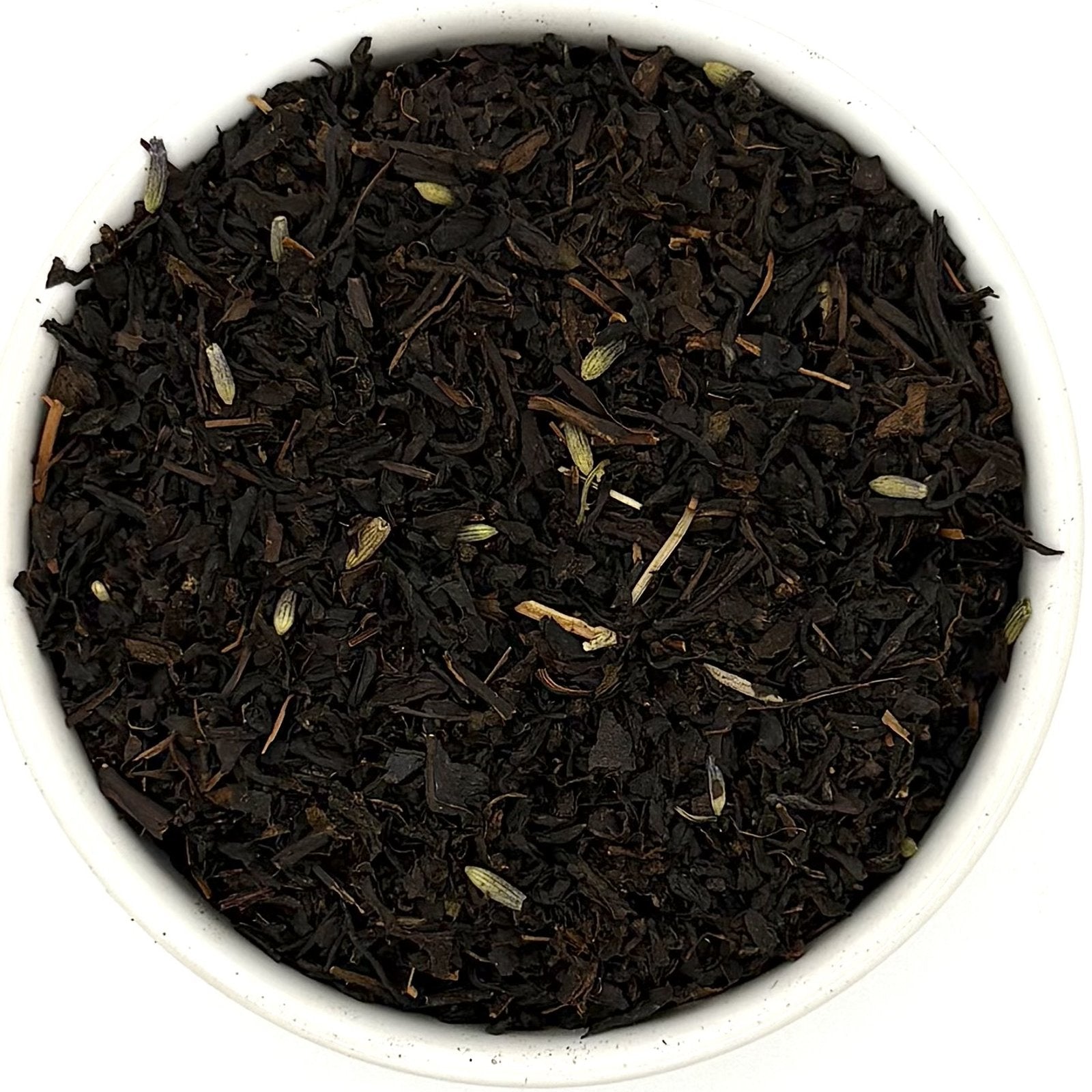 Top view of Earl Grey Lavender tea showing black tea and lavender buds in bowl