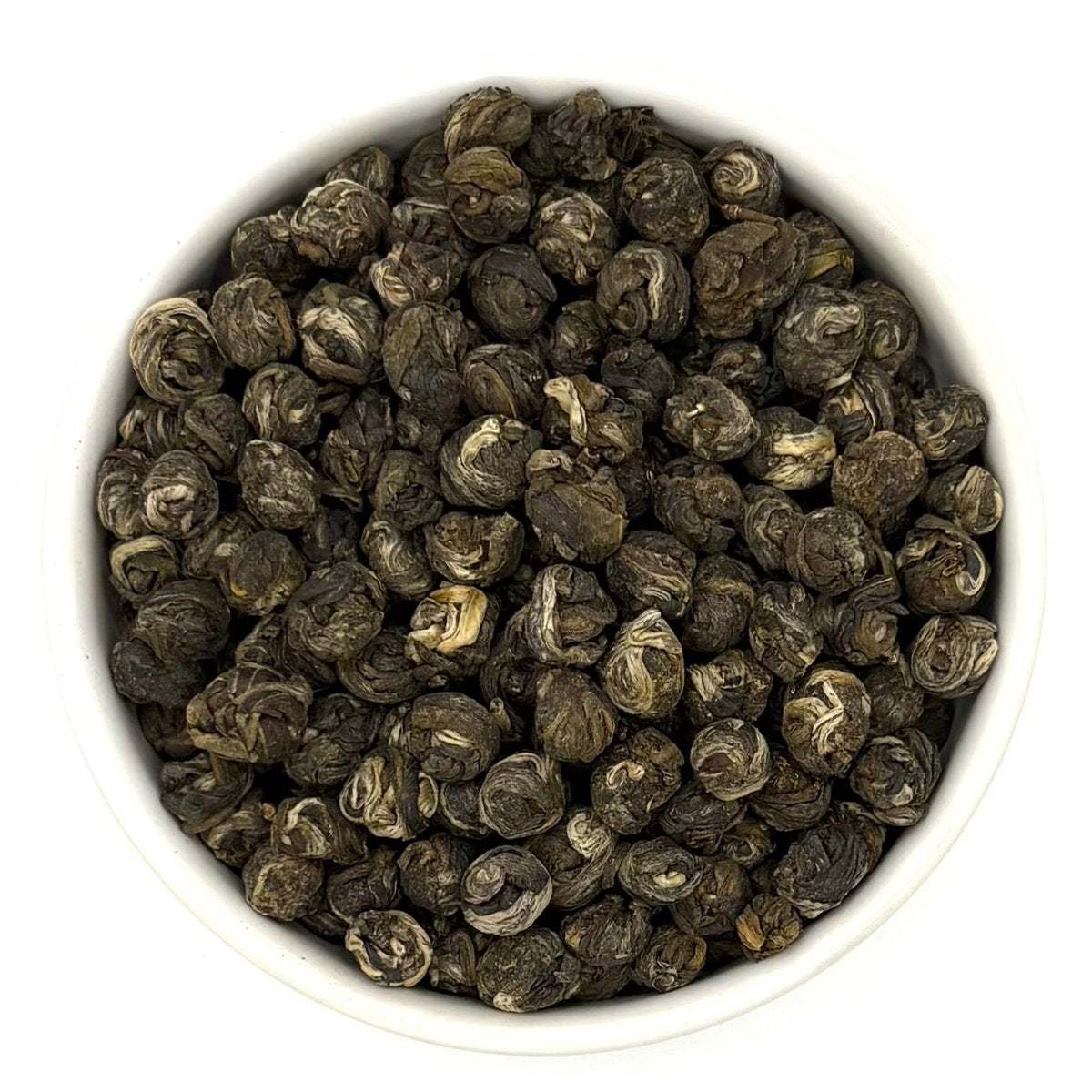 Top view of Organic Jasmine Pearls green tea in bowl