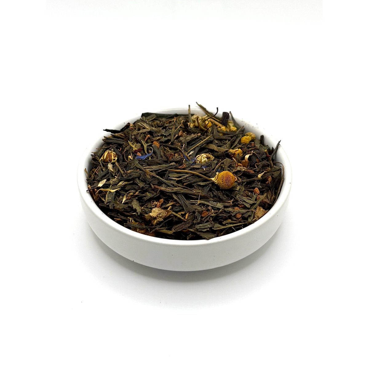 Angled view of Green Tea Garden loose leaf blend with green tea, flowers, and spices