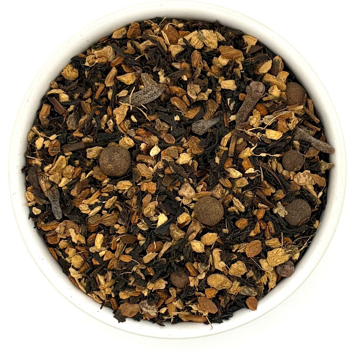Top view of Organic Pumpkin Spice tea with fall spices in bowl