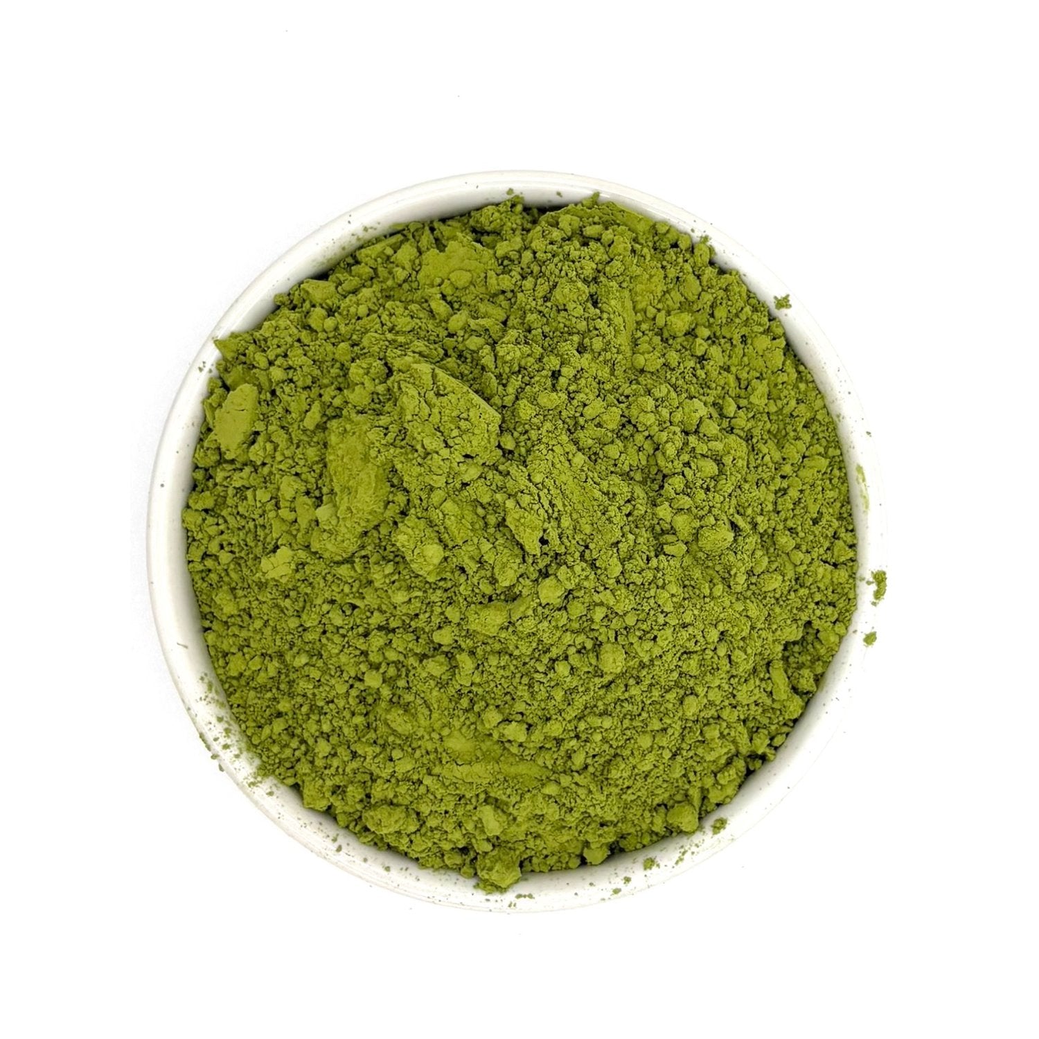 Top-down view of finely ground ceremonial matcha green tea in bowl